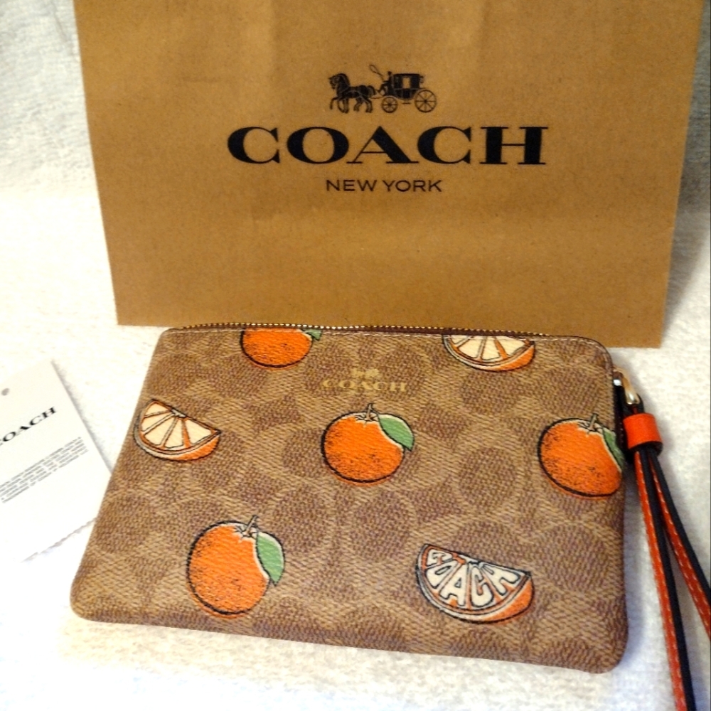 Coach Signature Wristlet  🍊🍊